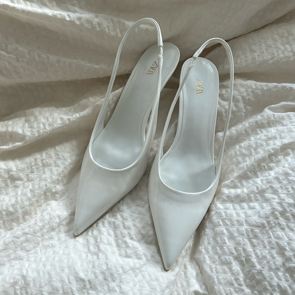 White patent leather kitten heels